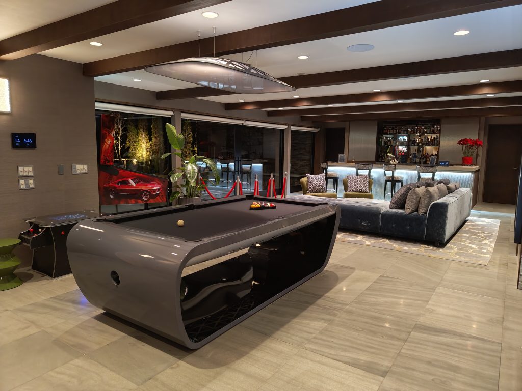 A billiard table in a luxury spacious room